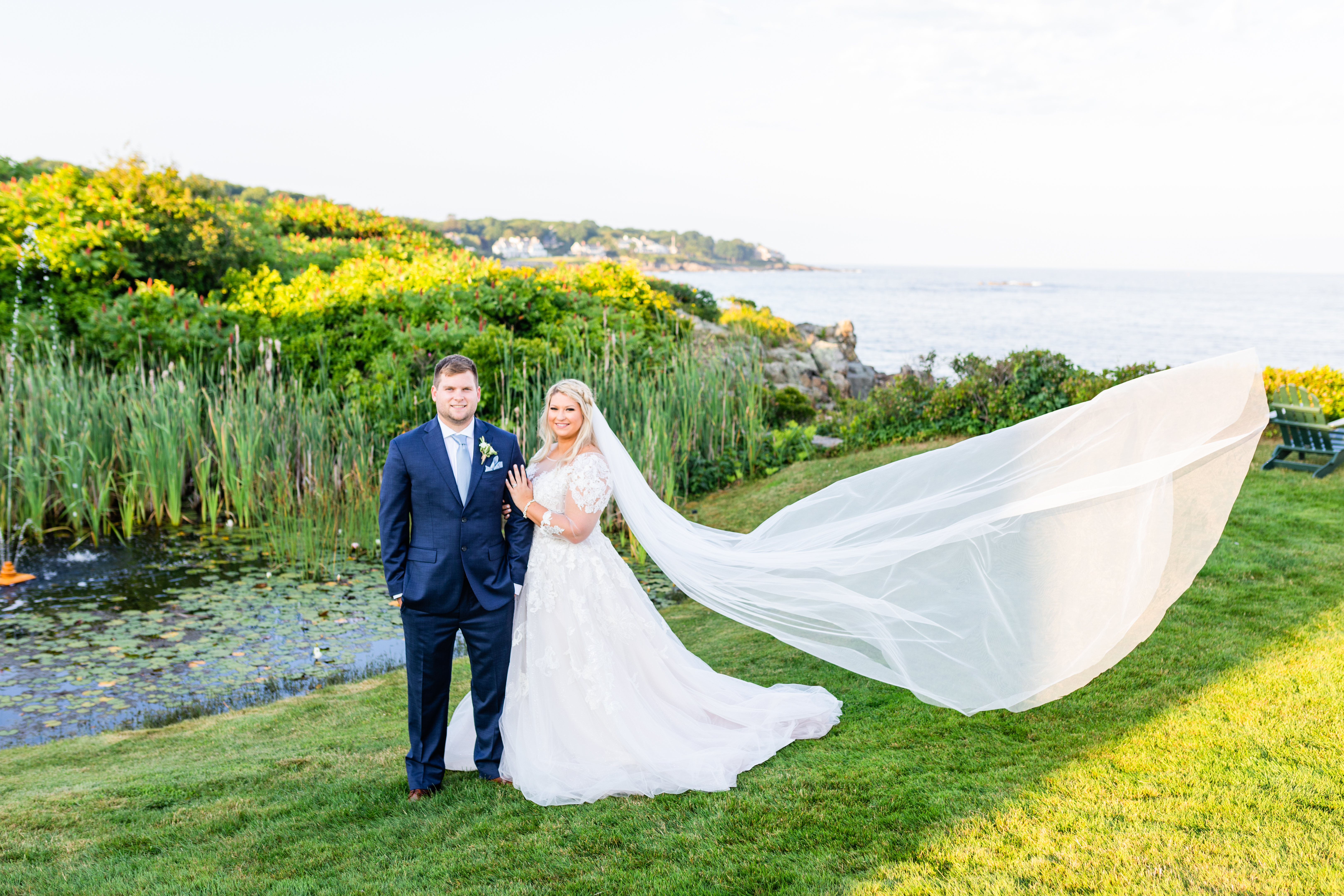 Image of bride looking off holding bouquet