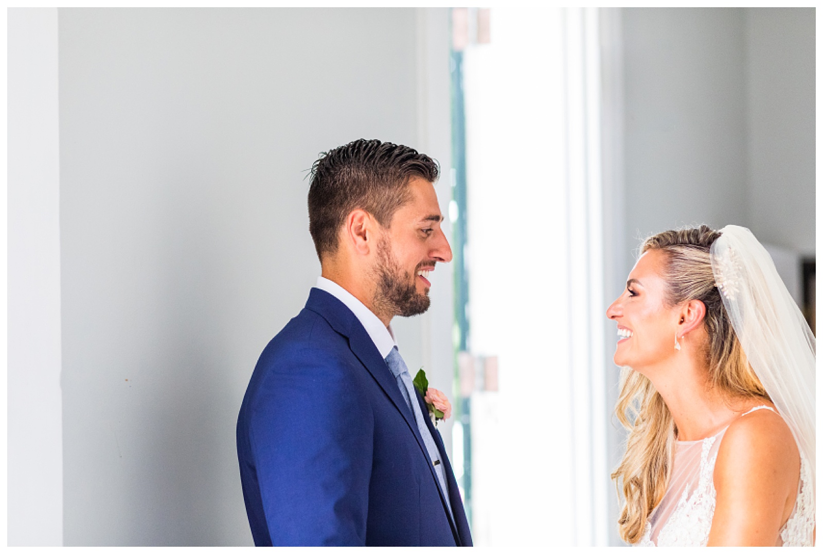 bride and groom after wedding happily looking at each other