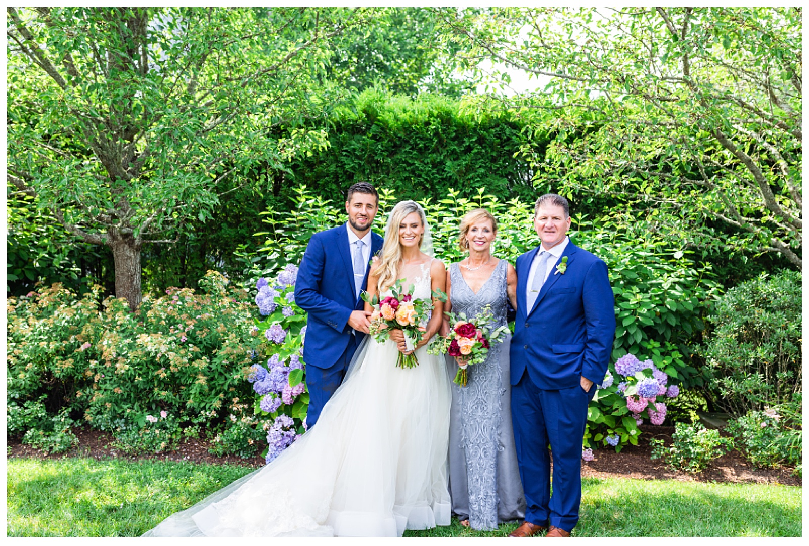 bride and groom with groom's parents