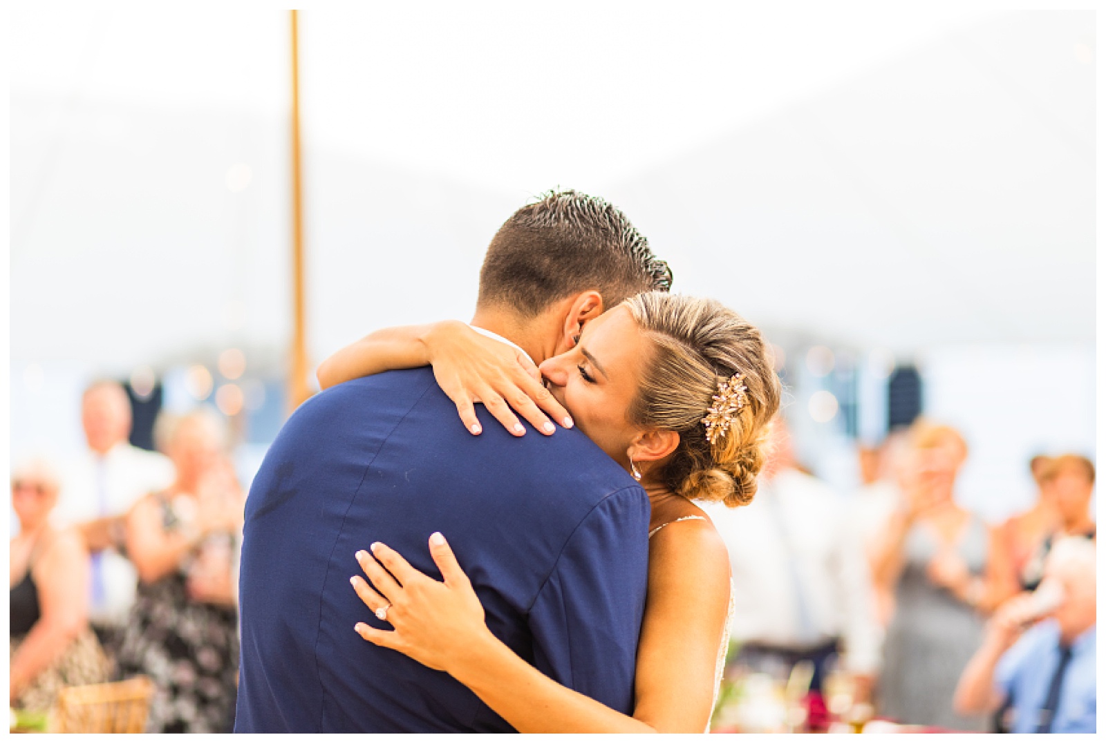 bride and groom hugging during first dance