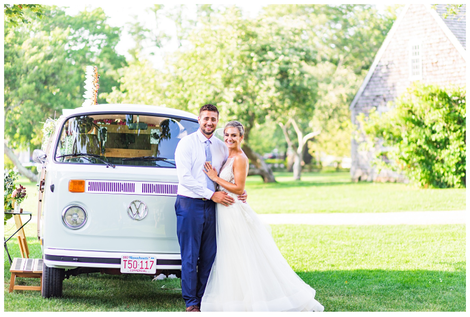 bride and groom next to photo booth van