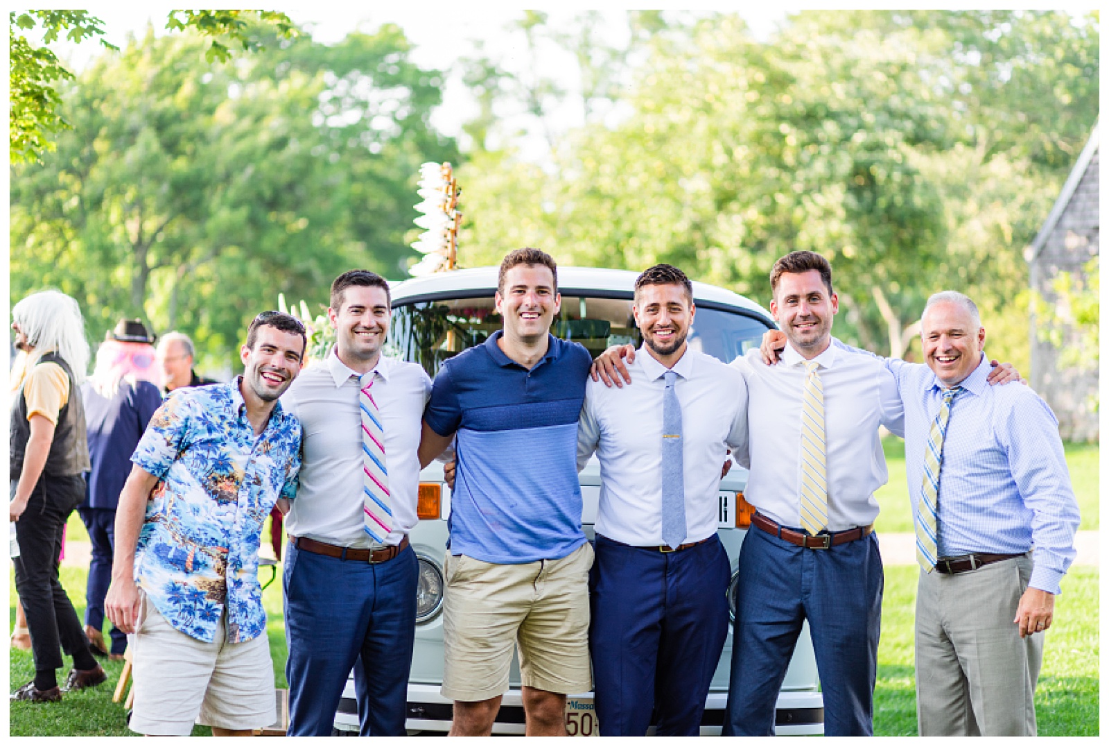 groom with his buddies and old coach